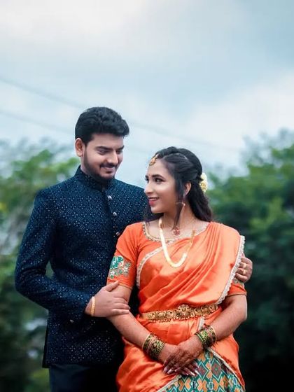 A romantic portrait of an engaged couple, sharing a look. We capture the excitement and love as you begin your journey to marriage.