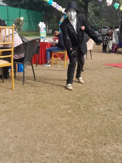 The Charlie Chaplin character strikes a classic pose, providing unique and nostalgic entertainment for both kids and adults.