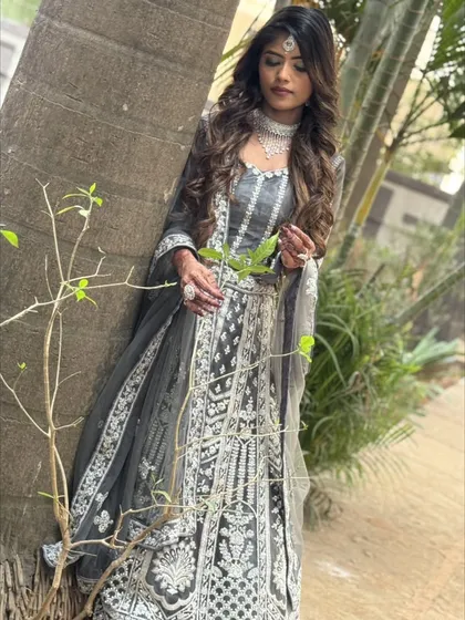 A duplicate of 198, a beautiful pose in the grey lehenga.