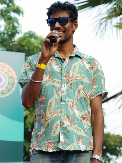 The event emcee in his element, hosting the UKG Unity Run. I select charismatic hosts who can command the stage and keep the energy levels high throughout the event.