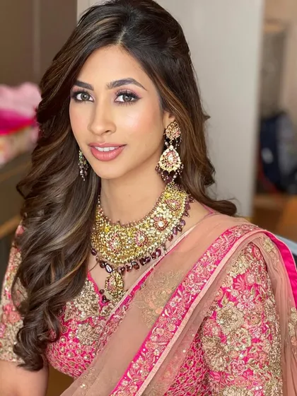 The final look, a simple yet stunning hairstyle for a modern bride.