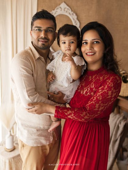 More than just photos, my family sessions are about connection. This is a beautiful, naturally lit portrait of a family of three.