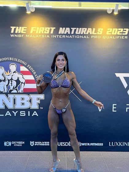 Holding my 4th place medal. In a tough lineup of 18 experienced athletes, this placing was a huge achievement and a testament to my hard work.