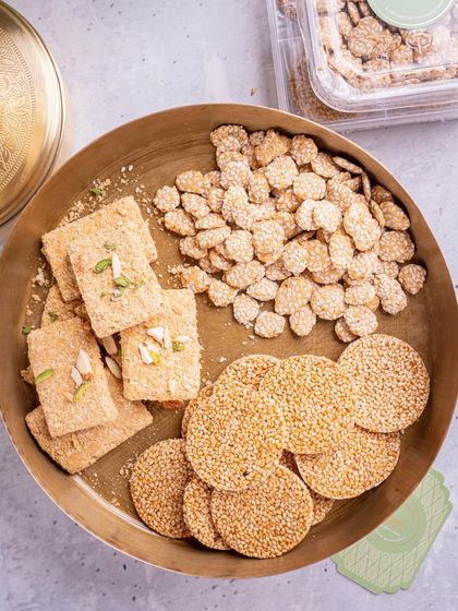 A closer look at my Makar Sankranti sweets platter. You can see the texture of the til chikki and the delicate layers of the gajak, all made the old-fashioned way with no preservatives.