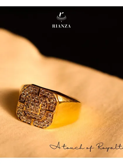 Another look at the men's diamond engagement ring, showcasing its glamorous and royal appeal. The yellow gold finish adds a classic touch to the brilliant diamond setting.