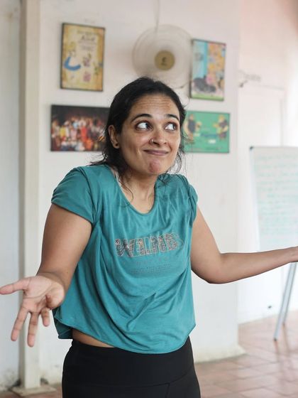 An actor shrugs during a "Gretel" rehearsal.
