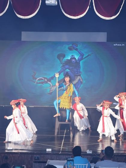 The stage comes alive with our young performers during the Shiv prayer dance, showcasing a mix of traditional and contemporary movements.