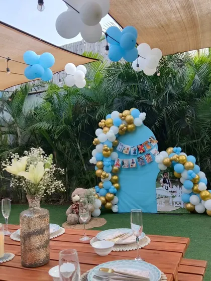 Another view of the first birthday setup, showing the charming details from the picnic table perspective.