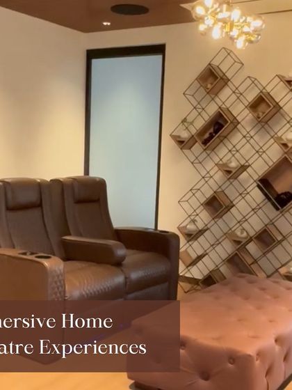 Our showroom features multiple setups, including this immersive home theater space with comfortable seating. It's the perfect place to experience the difference high-quality integration makes.