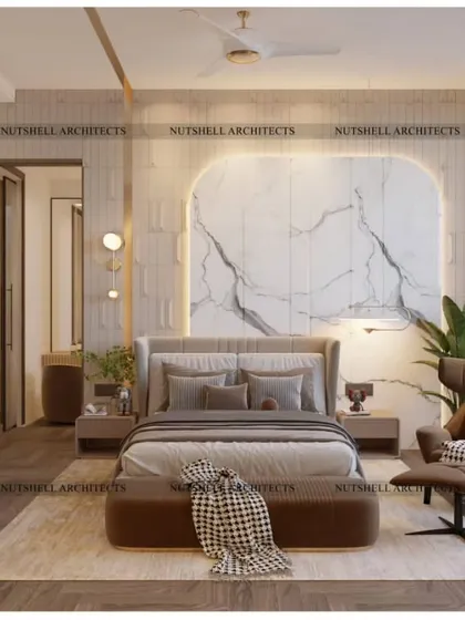Opulence is key in this master bedroom, where a large slab of statuario marble creates a breathtaking feature behind the bed. The natural veining of the stone is a work of art in itself.