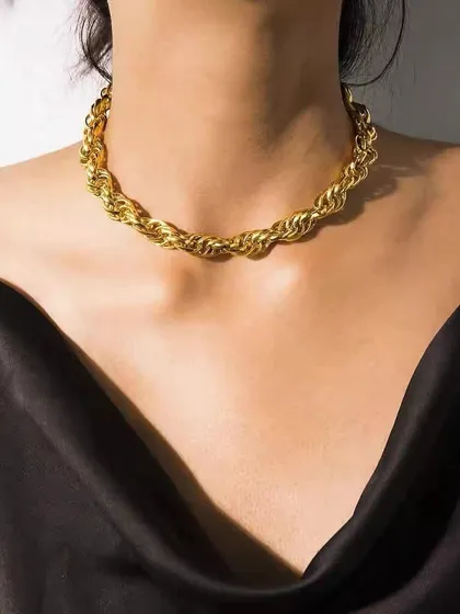 For a bolder look, I designed this chunky rope chain necklace. It's crafted from high-quality stainless steel with a polished gold-tone finish that sits beautifully on the collarbone.