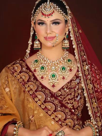 A powerful and classic bridal portrait. The combination of a flawless base, defined eyes, and perfectly matched jewelry creates an unforgettable image of bridal beauty.