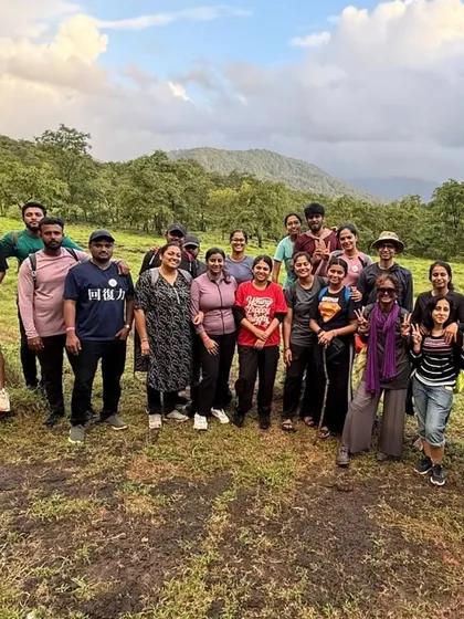 A moment of rest on a grassy patch during a trek. These breaks are perfect for soaking in the views and getting to know your fellow travelers.