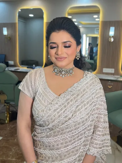 Eyes closed, you can see the beautiful, soft blend of the eyeshadow. It's a classic look that never goes out of style.