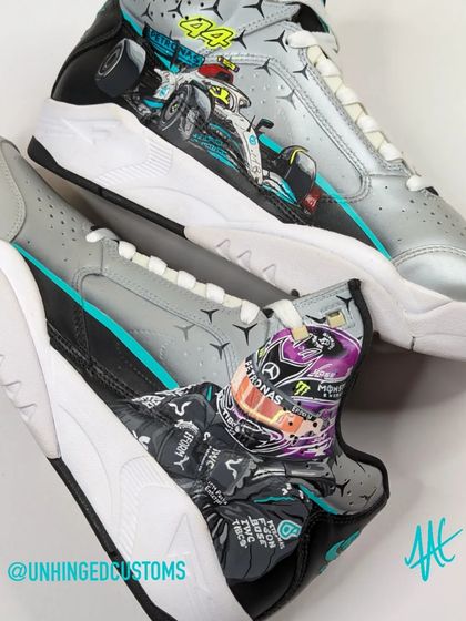 Detailed portraits of Lewis Hamilton in his helmet and his Mercedes F1 car, painted on the outer side of the Jordan Flights.