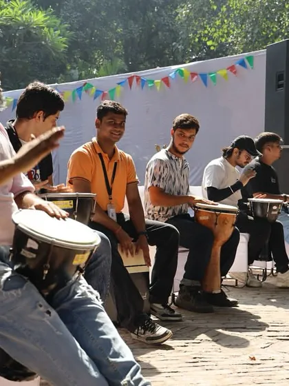 A powerful drum circle in session at the Bal Utsav. Drum circles are a core part of our events, bringing people together through rhythm and shared energy.