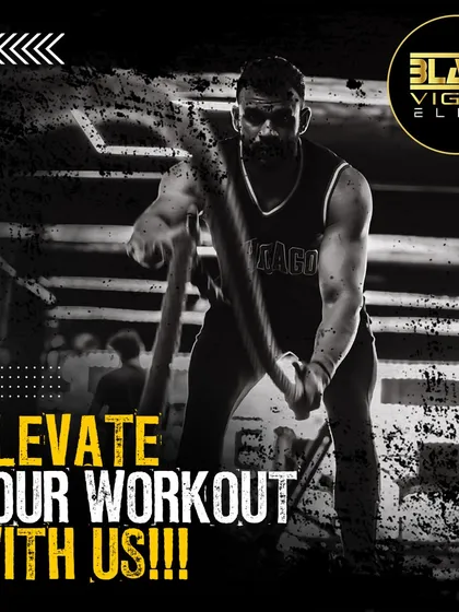 Elevate your workout with us. This image captures the intensity and focus of our functional training sessions, using battle ropes to build explosive power and endurance.