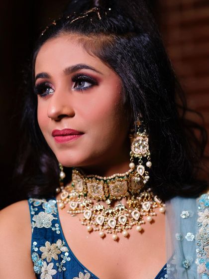 Another angle of the engagement makeup, showing the blend of the eyeshadow and the detail of the kundan earrings.