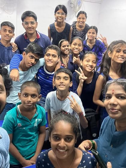 Navratri Day 4, 2023: Royal Blue. A group selfie with students and teachers.
