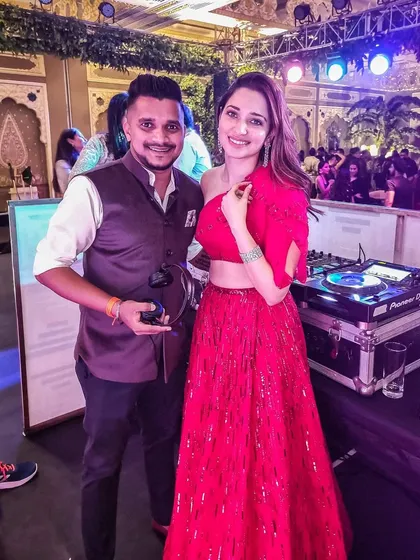 Posing for a photo with the gorgeous actress Tamannaah Bhatia after my set at a wedding in Jaipur. It was a pleasure to have her attend the event.