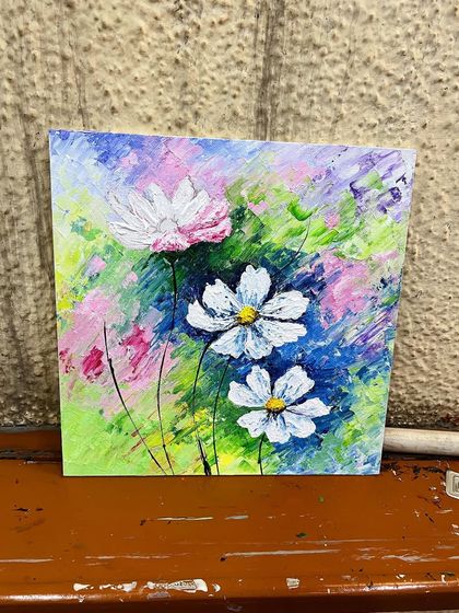 A finished impasto floral piece, showcasing the depth and vibrancy that comes from applying thick acrylic paint with a palette knife.