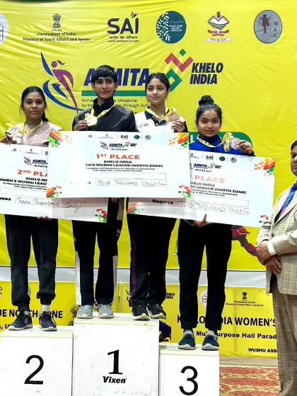 Results speak louder than words. My students on the podium at the Khelo India Women's Wushu League, a national-level platform. We don't just participate; we aim for the top spot.