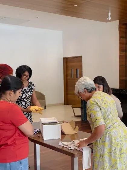 Here are participants in a community workshop getting hands-on with different folding techniques. I believe in learning by doing, and these sessions are all about giving you the muscle memory to stay organized.