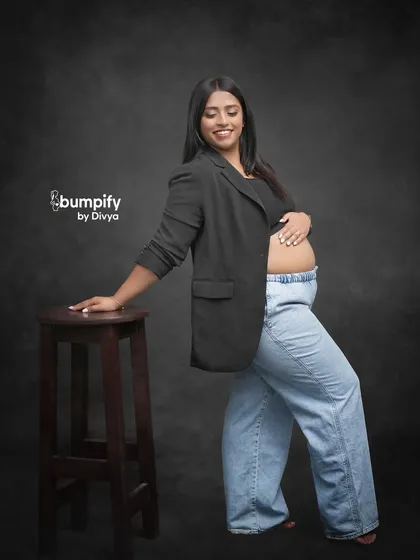 Another great shot from this modern, casual session. The simple dark background keeps all the focus on the glowing mom-to-be.