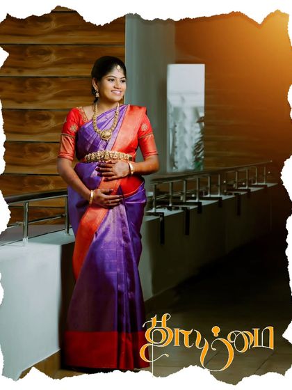 A similar creative portrait with a torn-paper effect and warm lighting. The Tamil script for "Thaimai" adds a personalized and artistic touch to this beautiful maternity photo.