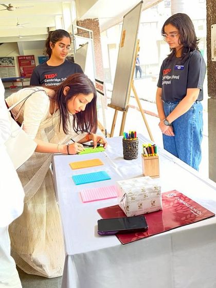 Interacting with the student organizers after my TEDx talk. It's inspiring to see the next generation so engaged with important social issues like mental health and digital well-being.