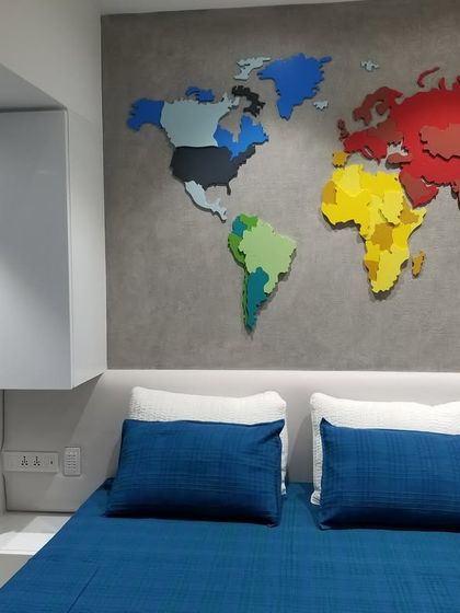 A close-up of the colorful 3D world map in this vibrant kid's room. It's a great example of how we incorporate fun, interactive elements into our designs to spark imagination.