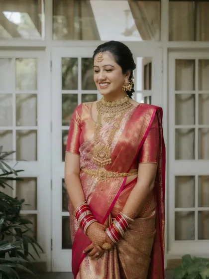 The elegance of tradition is always breathtaking. I captured this portrait of Shubhangini, a beautiful South Indian bride, showcasing the rich textures of her Kanjivaram saree and the intricate gold temple jewellery.