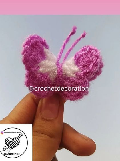 A closer look at our handmade crochet butterfly charm. The fuzzy texture and simple design make it a sweet and subtle accessory.