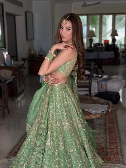 Another angle of this beautiful Anushree Reddy design. The soft, natural makeup allows the intricate outfit and the bride's beauty to take center stage.