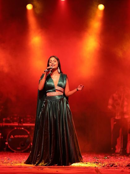 The outfit commands the stage. It’s designed to be comfortable for a performer while looking absolutely glamorous.