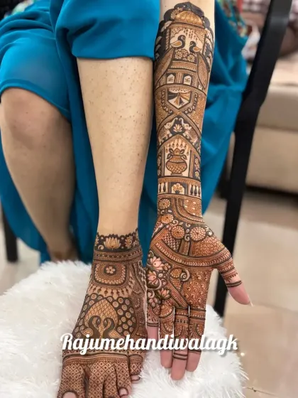 This image shows a bride's complete look, with a full-arm design on one hand and a matching intricate design on her foot.