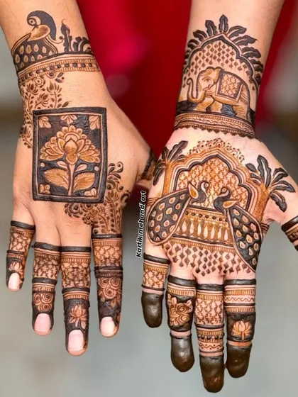 A beautiful composition of traditional motifs, with a lotus on one hand and an elephant and peacock on the other, demonstrating our versatile artistry.