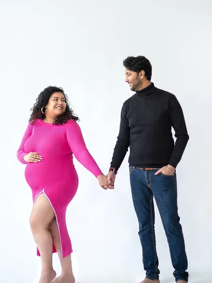 Holding hands, looking forward to the future together. A simple pose that speaks volumes about your shared journey.