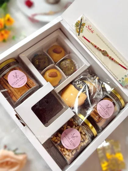 The 'Pyaar Bhara Box' for Rakhi is my most elaborate hamper. It includes Indian sweets, savory crackers, cookies, a brownie, and two snack jars.