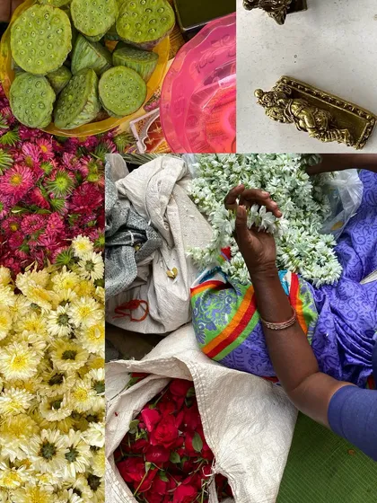 A vibrant flatlay of flowers for sale at a market, including lotus pods, chrysanthemums, and roses.