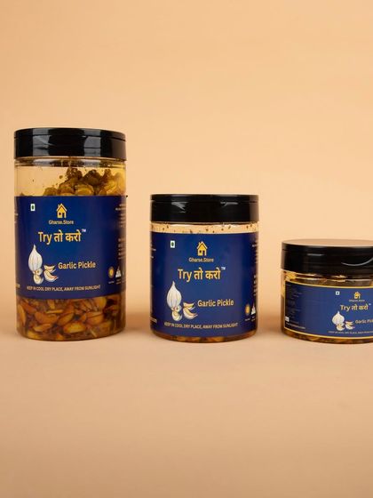 A lineup of the three different sizes of Garlic Pickle jars.