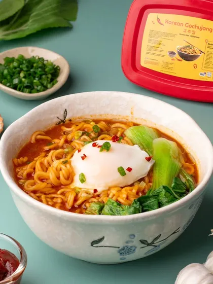 Another angle of our spicy ramen shoot for Moi Soi. This image captures the rich texture of the noodles and the fresh toppings, making it a great asset for menus or social media.