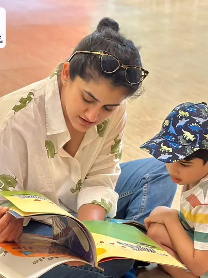 A quiet moment of connection over a book during our summer workshop. Storytelling is at the heart of what we do.