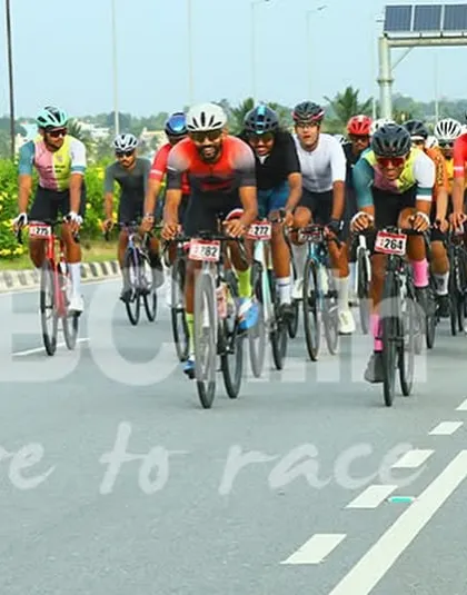An arrow on the road guides the peloton. I ensure all my race courses are clearly marked for the safety and convenience of the riders.