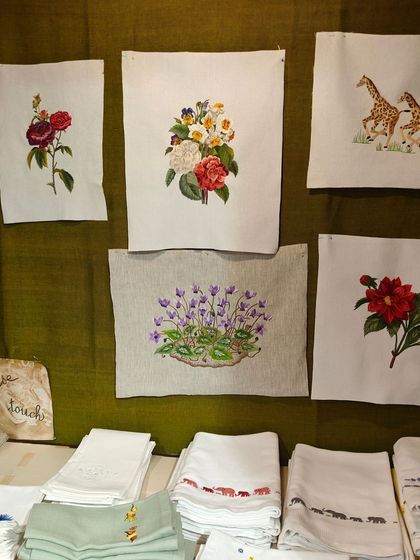 The intricate and beautiful embroidery work done by the women at the Cluny Embroidery Centre. Each piece represents a story of skill, resilience, and financial independence.