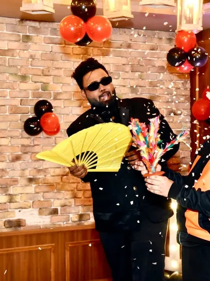 A colorful flower production trick with a young assistant. The vibrant props and exciting reveals are perfect for keeping children entertained.