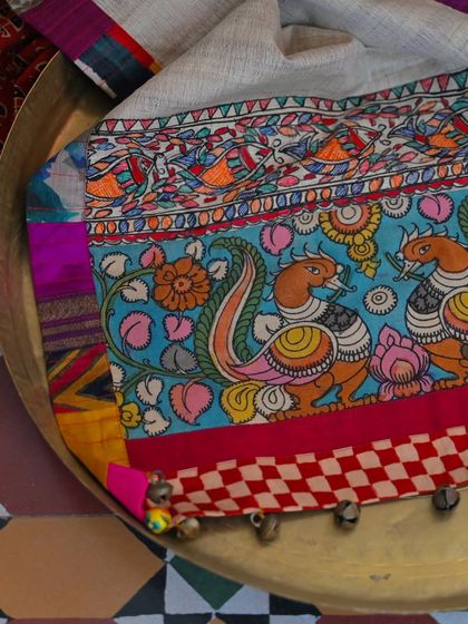 Another detail shot of the Madhubani panel, highlighting the vibrant colors and traditional folk art style.