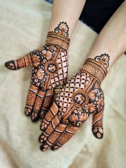 A gorgeous siders design featuring a central mandala with an elephant motif. The surrounding jaali (net) pattern and floral details add depth and elegance.