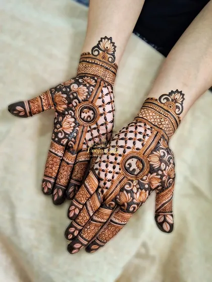 A gorgeous siders design featuring a central mandala with an elephant motif. The surrounding jaali (net) pattern and floral details add depth and elegance.