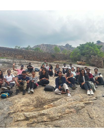 The crew resting on the rocks at Huthridurga, enjoying the view and the company.